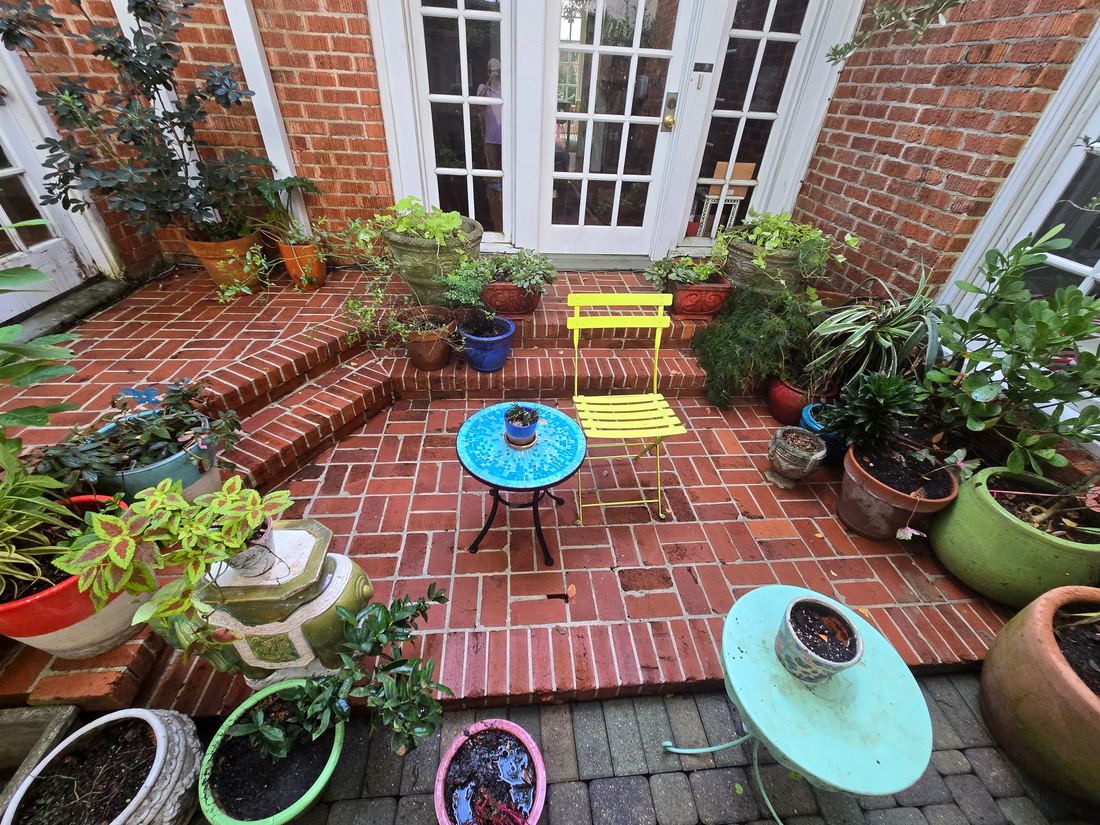 Brick courtyard restored to vibrant color after cleaning